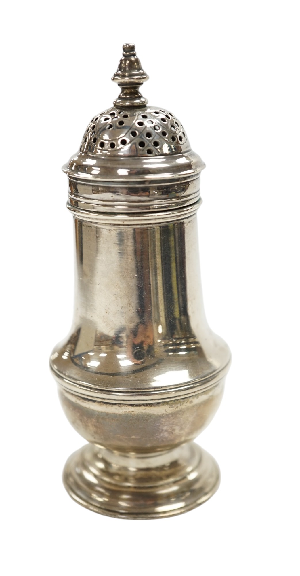 A George III silver baluster pepperette, by Samuel Wood, London, 1768, 10.7cm (cover unmarked). Condition - fair